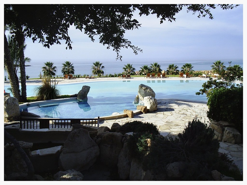 Coral Bay beach near Paphos, Cyprus, a curved sandy bay with blue water