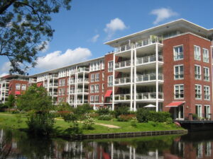 Modern new-build apartment block with clean lines and balconies