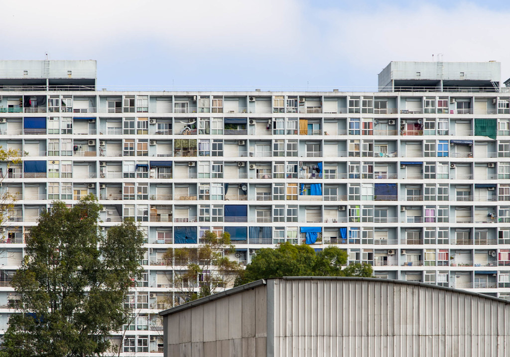 Contemporary apartment building facade with large windows