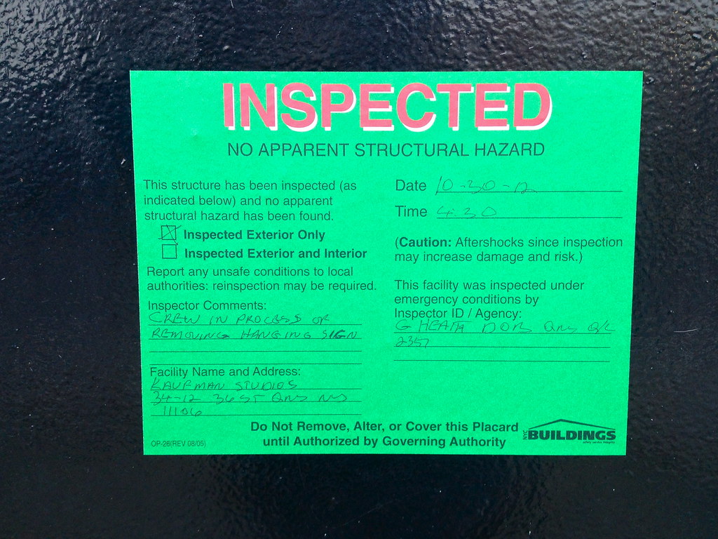 Inspector checking a building's condition during a site inspection