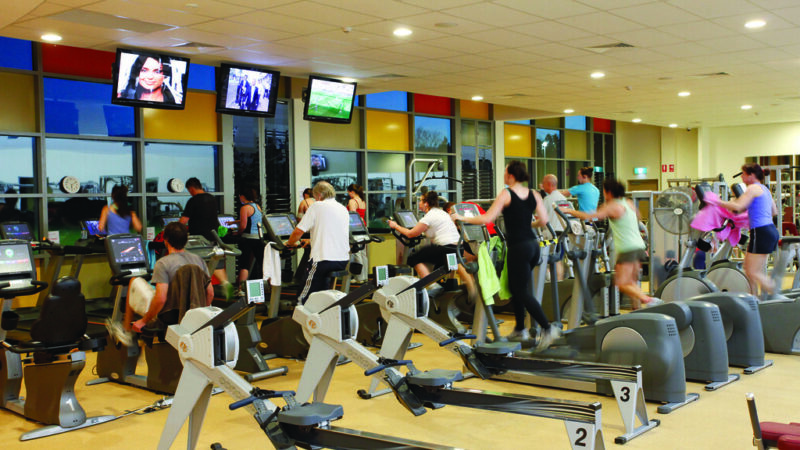 Gym floor with cardio machines and weight equipment
